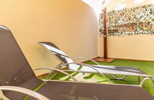 Plaza de Toros Vieja Apartment | Beautiful Soho Garden: Oceanfront Family-Friendly Retreat