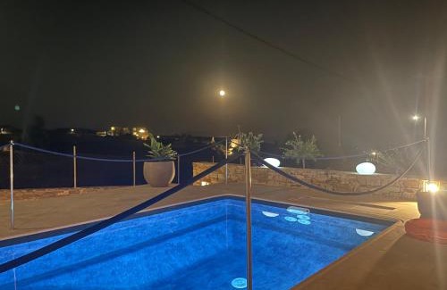 Schinoussa Town Apartment | Indulge at Sohoros Luxury Suites with Oceanfront Amenities