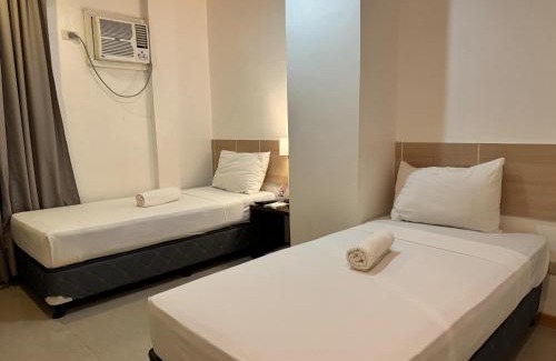 Talibon Hotel | Discover Soi Suites: Family-Friendly with Breakfast & Kitchen