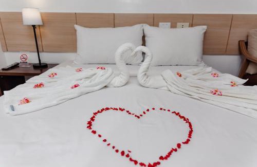 Talibon Hotel | Discover Soi Suites: Family-Friendly with Breakfast & Kitchen