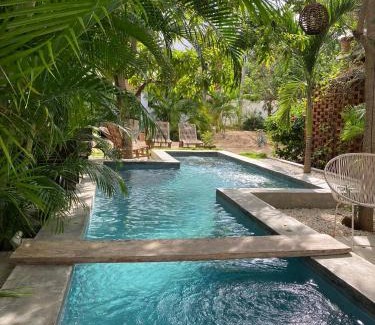 San Pedro Pochutla Apartment | Discover Soiree: Ocean View, Pool & Family-Friendly Stays