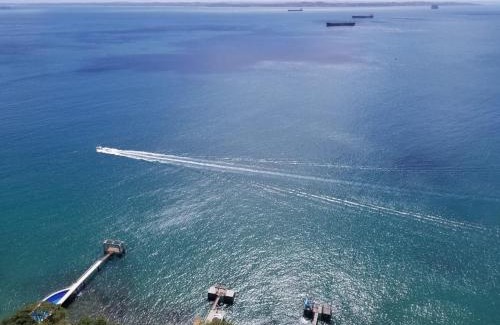 Vitoria Apartment | Relax at Sol Vitória Marina with Oceanfront Pools & Views