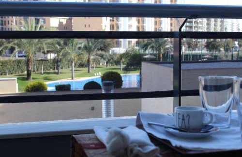 Playa de San Juan Apartment | Relax at Sol y Playa: Oceanfront Oasis with Pool & Kids' Fun