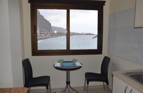 Playa de la Calera Apartment | Tranquil Sol y Playa: Oceanfront Retreat for Families