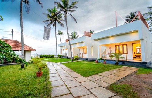 Anchal Villa | Relax at Solaris Cliff Beach Resort Varkala by VOYE HOMES