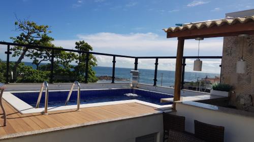 Rio Vermelho Apartment | Relax at Solaris Home: Family-Friendly with Pool & Hot Tub