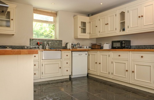 Chippenham Cottage | Family-Friendly Somerford Cottage with Cozy Open Fire