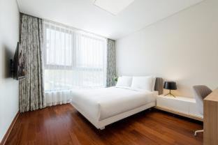 Andeok Apartment | Elegant Somerset Jeju Shinhwa World with Private Pool
