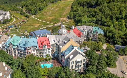Mont-Tremblant Pedestrian Village Hotel | Experience Sommet Des Neiges: Family-Friendly Oceanfront Retreat
