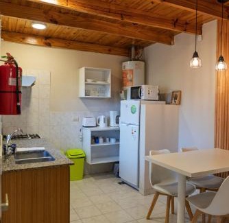 El Calafate Apartment | Top-Rated Somos Punto Aparts with Hot Tub & Fireplace