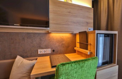 Volkach Hotel | Discover Sonnenhotel Weingut Römmert: 4-Star Retreat with Spa
