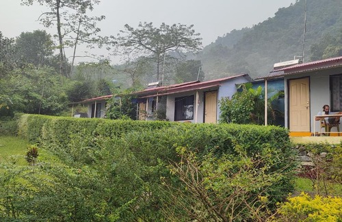 Pokhara House | Comfortable Sosa Beds & Restaurant: Pet-Friendly Retreat