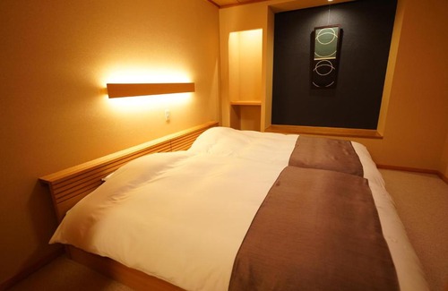 Handeki Onsen Hotel | Soumeian: Family-Friendly Retreat with Hot Tub & 9.2 Rating