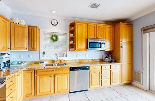 Bay Point House | ```html
Scenic Soundfront Home with Ocean Views and Full Kitchen
```
