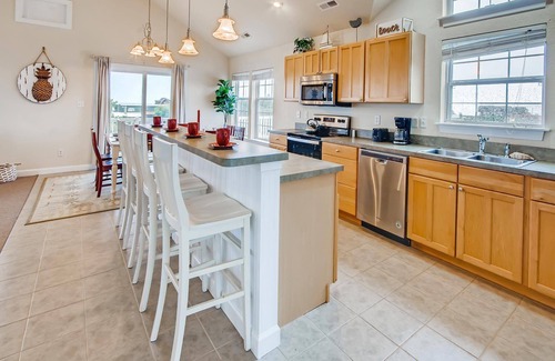 Wind Over Waves House | Soundside Retreat: Dog Friendly with Pool & Hot Tub Access