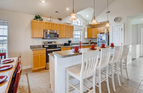 Wind Over Waves House | Soundside Retreat: Dog Friendly with Pool & Hot Tub Access