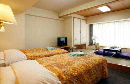 Kamikawa House | Relaxing Retreat at Sounkyo Kanko Hotel with Spa & Hot Tub