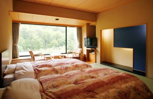 Kamikawa House | Relaxing Retreat at Sounkyo Kanko Hotel with Spa & Hot Tub