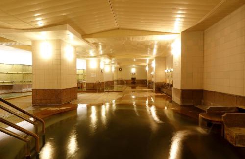 Kamikawa Hotel | Discover Sounkyo Kankou Hotel: Family-Friendly Comfort