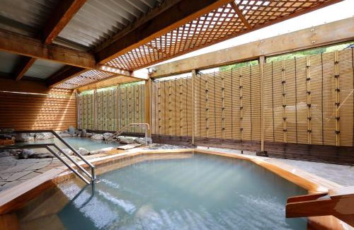 Kamikawa Hotel | Discover Sounkyo Kankou Hotel: Family-Friendly Comfort
