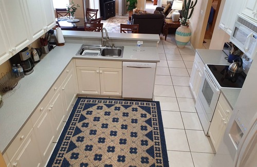 Central Naples House | Lake View Retreat with Heated Saltwater Pool & Tesla Charging