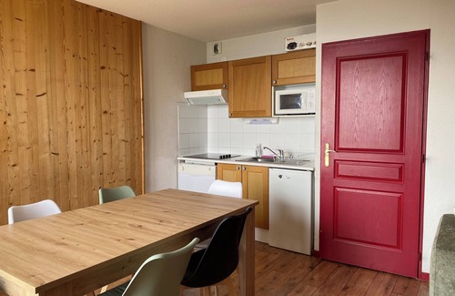 Montgellafrey Apartment | South-facing, large living room, mountain views and private covered parking.