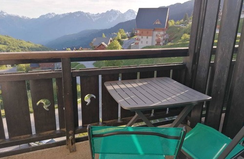 Montgellafrey Apartment | South-facing, large living room, mountain views and private covered parking.