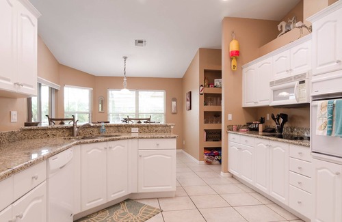 Marco Island House | Discover Southend: Poolside Retreat with Spa & Kayaks