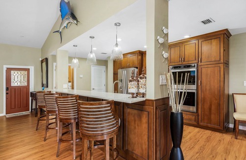 Fort Myers House | Waterfront Oasis: Heated Pool, Spa & King Beds Await You