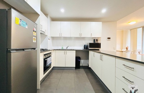 Warwick Farm Apartment | Family-Friendly Retreat in Southwest Liverpool with Parking