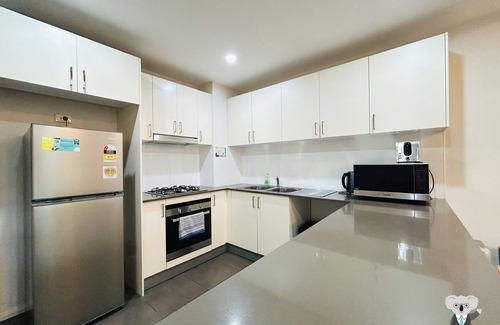 Warwick Farm Apartment | Family-Friendly Retreat in Southwest Liverpool with Parking