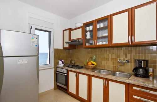 Podstrana Apartment | Exceptional 110 m2 Apartment with Terrace Steps from Beach