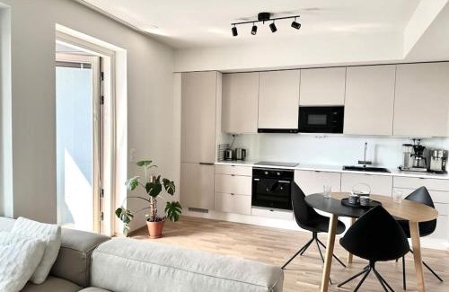 Keskinen District Apartment | Bright 1BR Retreat with Balcony, Rated 9/10 by Guests