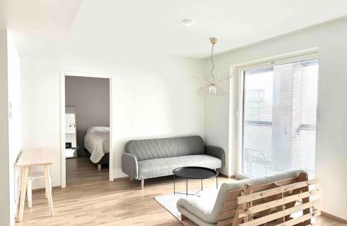 Keskinen District Apartment | Bright 1BR Retreat with Balcony, Rated 9/10 by Guests