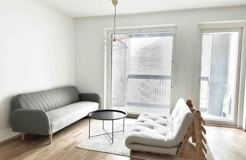 Keskinen District Apartment | Bright 1BR Retreat with Balcony, Rated 9/10 by Guests