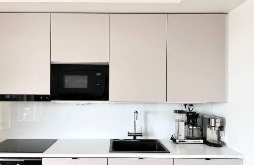 Keskinen District Apartment | Bright 1BR Retreat with Balcony, Rated 9/10 by Guests