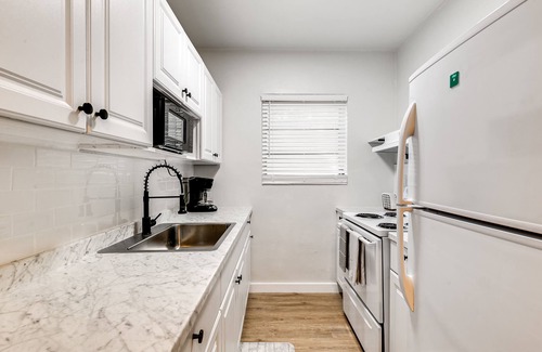 Virginia Gardens Apartment | Pet-Friendly 2 BR Retreat Near Miami Airport with Pool