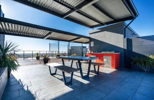 Adelaide Central Business District Apartment | Inviting 2-Bed Apartment with Pool, BBQ & WiFi Access