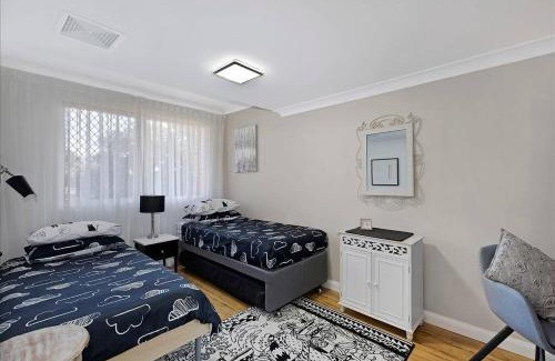 The Entrance Apartment | Family-Friendly 2BR Retreat Steps from The Entrance Beach