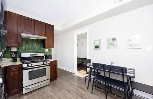 Brighton Park Apartment | Family-Friendly Tropical Retreat in Chicago with Spa Amenities