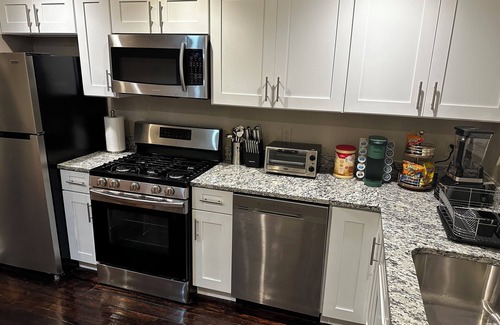 Downtown Baltimore House | Modern 3 Bedroom Townhome with Hot Tub in Baltimore