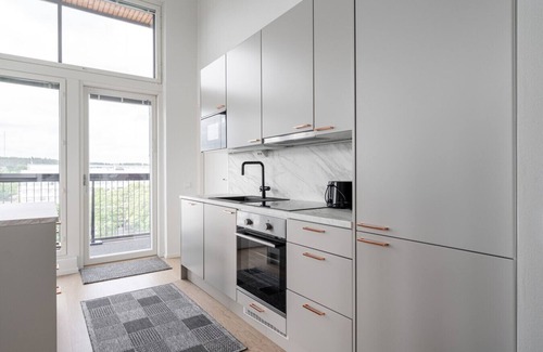 Tampere Apartment | Spacious 3BR Penthouse Loft in Historical Amuri