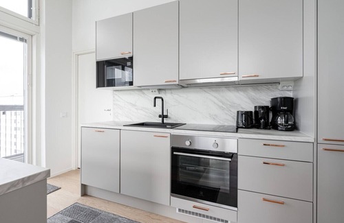 Tampere Apartment | Spacious 3BR Penthouse Loft in Historical Amuri