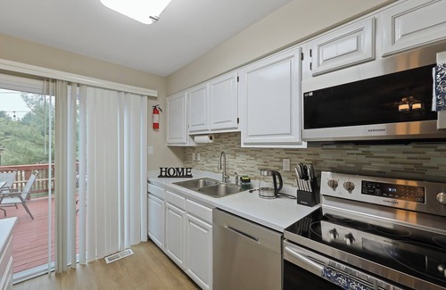 Calverton Apartment | Elegant 3BR Townhouse with Balcony and Top-Notch Amenities