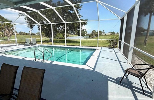 Oakland Hills House | Spacious 4/2 with heated pool and lake view FREE GOLF! Close to gulf beaches!