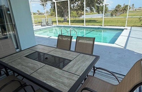 Oakland Hills House | Spacious 4/2 with heated pool and lake view FREE GOLF! Close to gulf beaches!