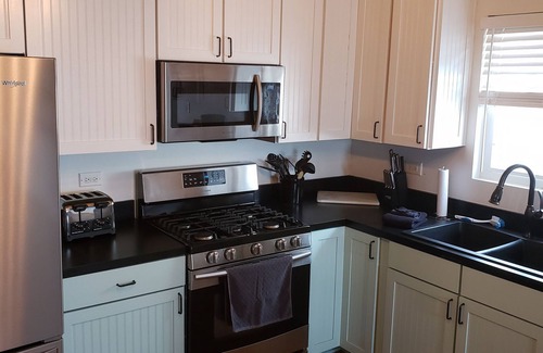 Bourbonnais House | Ideal Family Retreat: 4 Bedroom Home with Spa & Hot Tub