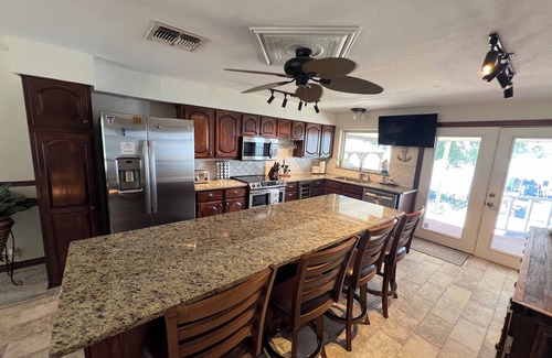 Azle House | Spacious 4-BR lake front WiFi ,hot tub, EV charger on Eagle Mountain Lake Azle