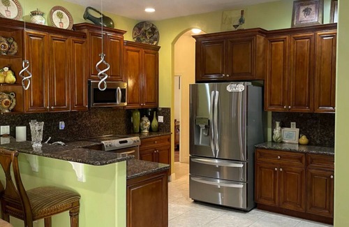 Port Saint Lucie House | Guest Rated 10/10 Villa with Backyard & Spa in PSL