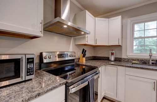 Thomasville House | Forest Hills Fun: Renovated Retreat with Family Amenities